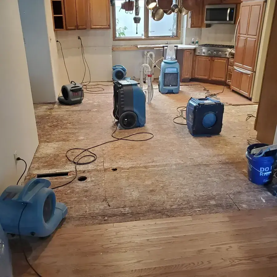 Kitchen floor opened up and drying after an appliance leak in Beaverton